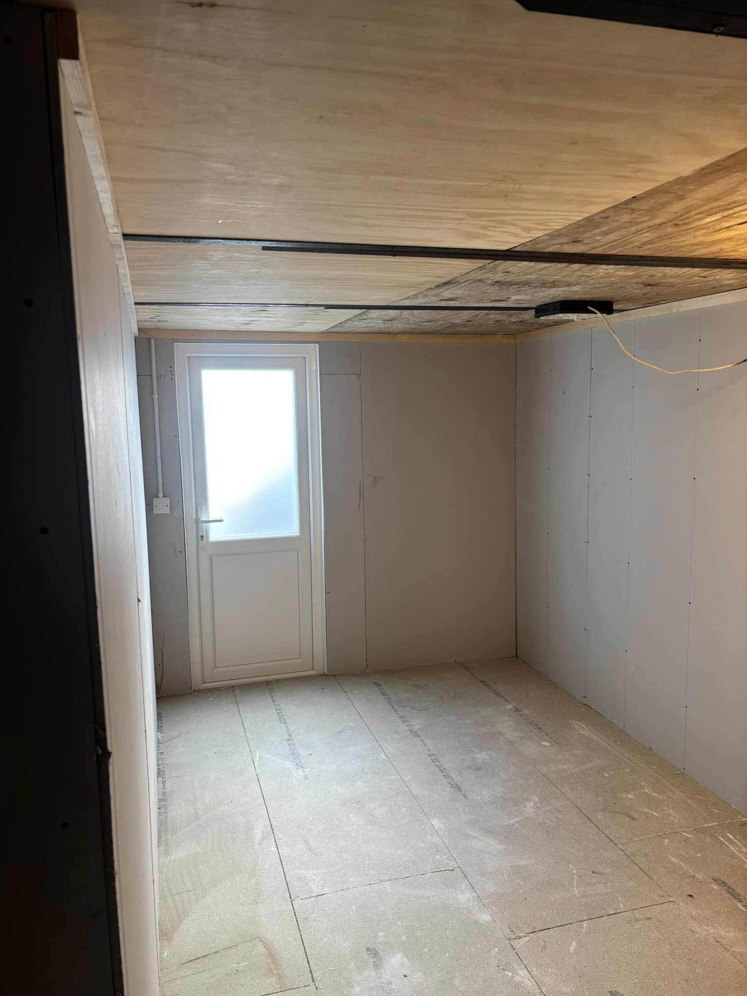 Garage conversion interior with skylight